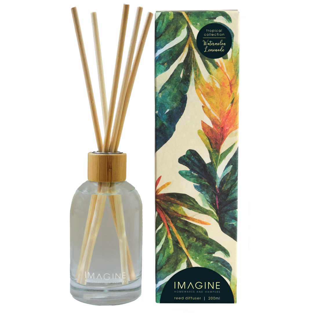 200ml Watermelon Lemonade reed diffuser from the Tropical collection in clear glassware, with its box featuring black and green patterns featuring tropical plants.